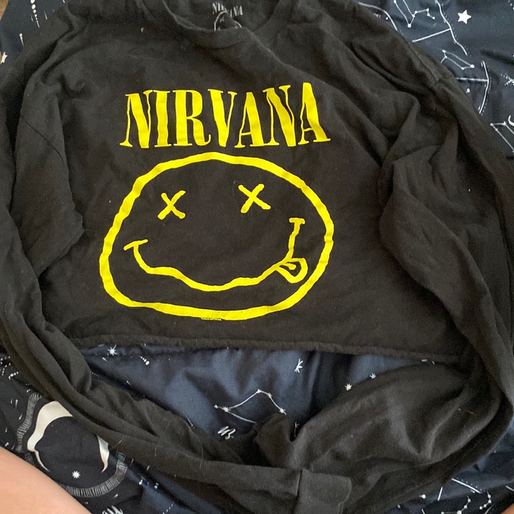 Nirvana yellow, and black, long sleeved crop top.